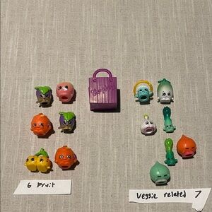 Shopkins, 13 Colorful Miniature Shopkins and shopping cart. Lot A5.